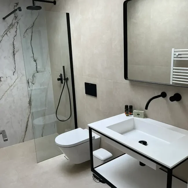 Refined bathroom design by ARENCOS, architects in Chania.